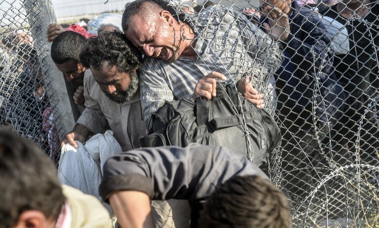 TOPSHOTS-TURKEY-SYRIA-REFUGEES