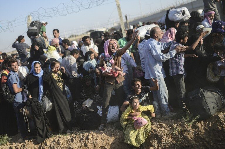 TOPSHOTS-TURKEY-SYRIA-REFUGEES