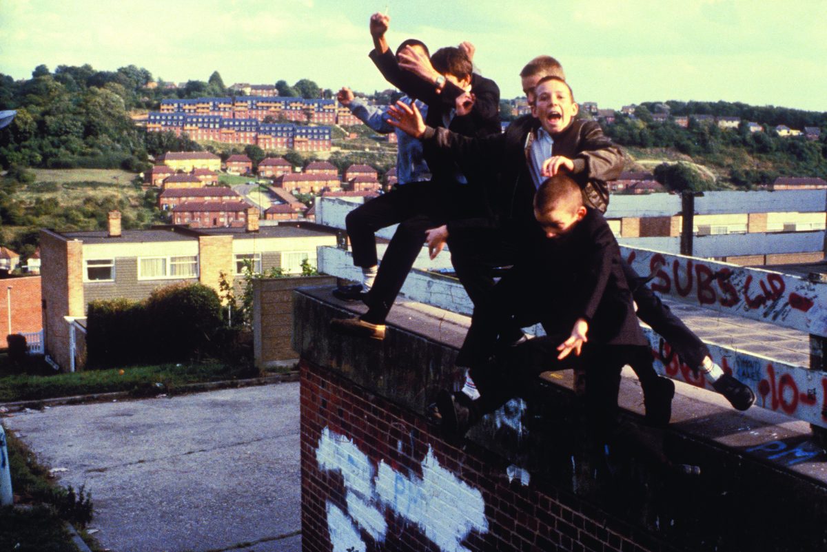 © Gavin Watson, A group of boys jumping of a roff, High Wycombe, UK, 1980's